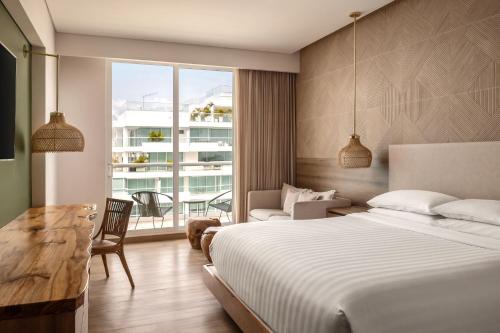 Habitación doble, vista parcial al océano, balcón