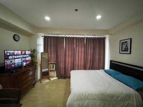 SOHO Central Condo 15F Fast Wi-Fi FREE NetFlix, Cainta