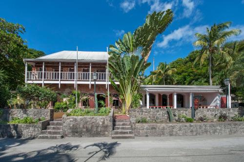 Exterior view, The Old Gin House in Oranjestad