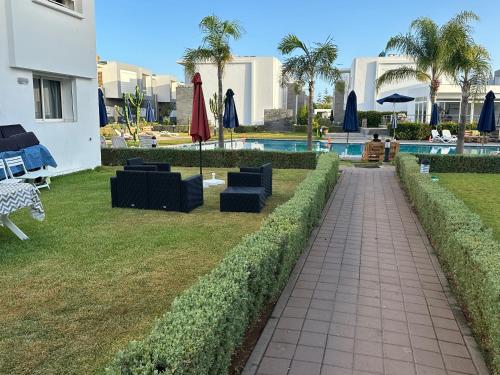 Appartement Sidi Rahal Résidence Dar Al Bahr avec 2 grands jardins au bord de la piscine (Appartement Sidi Rahal Residence Dar Al Bahr avec 2 grands jardins au bord de la piscine) in 시디 라할