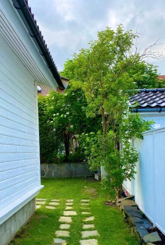 Down town apartment with outside area in villa in Kristiansand