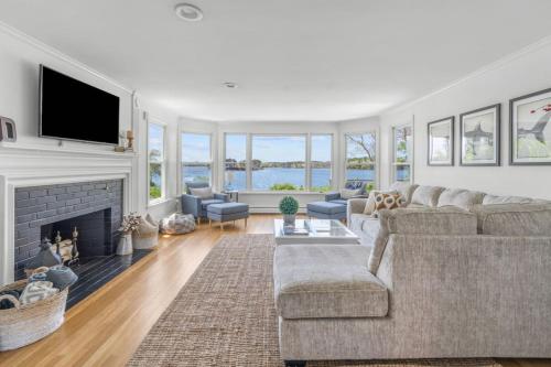 Stunning Waterfront Home with Hot Tub Deck Fire Pits and Office
