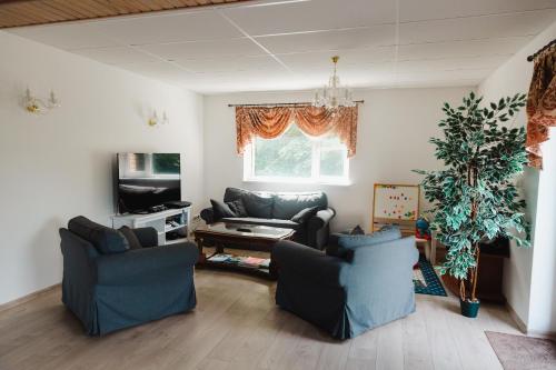 Shared lounge/TV area, Konrad Family Guesthouse in Kudjape