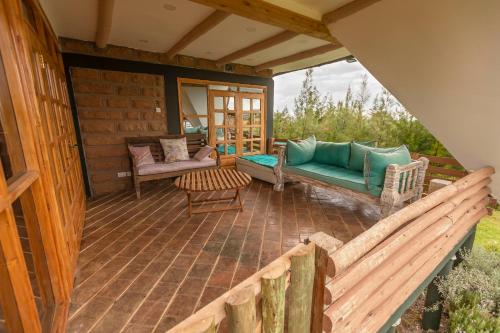 Balkons/terase, The Besotted Cottage at Mount Kenya Farm Stay in Naro Moru