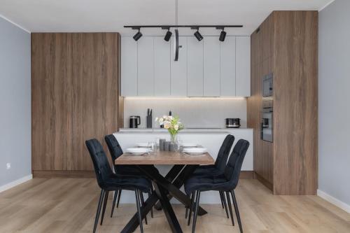 Cozinha, Katowice Brynów Apartament dla 4 osób z Parkingiem by Noclegi Renters (Katowice Brynow Apartament dla 4 osob z Parkingiem by Noclegi Renters) in Osiedle Zgrzebnioka