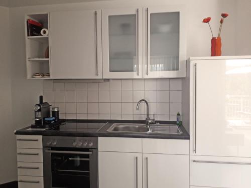 Konyha, Komfortapartment Schwarzwaldblick Nähe Golfplatz (Komfortapartment Schwarzwaldblick Nahe Golfplatz) in Bad Bellingen