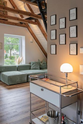 Traumhafte Ferienwohnung am Park, großer Balkon, voll ausgestattete Küche, Schreibtisch, WiFi, Smart TV, Carport, Wallbox, Fahrräder in Scheeßel, Deutschland