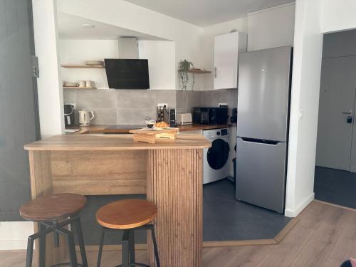 virtuve, Appartement proche Paris-Aéroport CDG-Gare-Disney (Appartement proche Paris-Aeroport CDG-Gare-Disney) in Arnouville