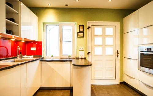 keuken, W20 I Gruppen I 7 Zimmer für 9 I 2 Bäder I Garten I Netflix Smart TV I Premium (W20 I Gruppen I 7 Zimmer fur 9 I 2 Bader I Garten I Netflix Smart TV I Premium) in Mettingen