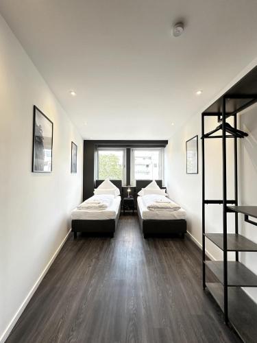 BLK Hostel Room Type - Twin Room with Shared Bathroom
