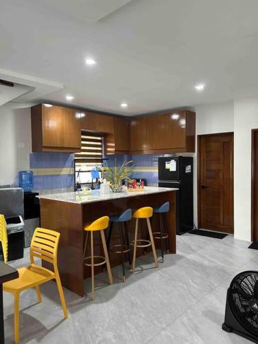 3 Storey Beachfront Villa with Pool by JCV in Bucana