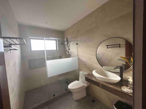 3 Storey Beachfront Villa with Pool by JCV in Bucana