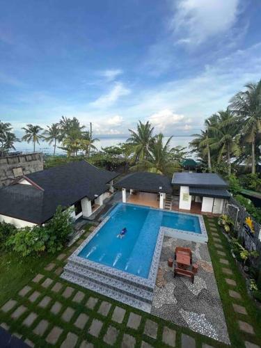 3 Storey Beachfront Villa with Pool by JCV in Bucana