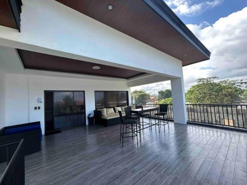 3 Storey Beachfront Villa with Pool by JCV in Bucana