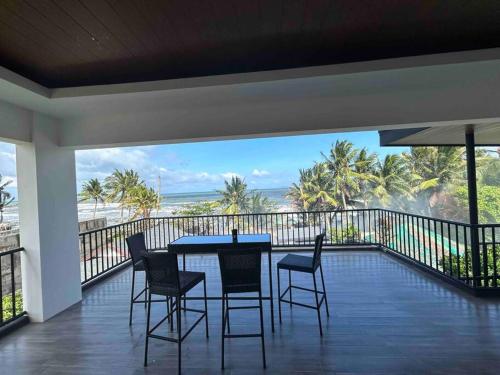 3 Storey Beachfront Villa with Pool by JCV in Bucana