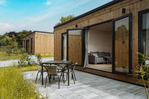BED & BIKE Resort Trzęsacz - domki, sauna, jacuzzi & rowery