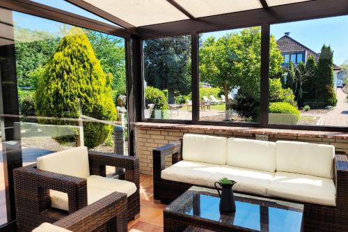 Garden, Moderne Ferienunterkunft in ruhiger Lage und nur 7 Gehminuten vom Strand entfernt - hoher Schlafkomf in Scharbeutz