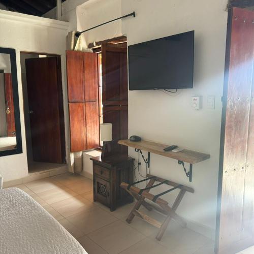 HOTEL PLAZA BOLIVAR MOMPOX ubicado en el centro histórico con parqueadero interno