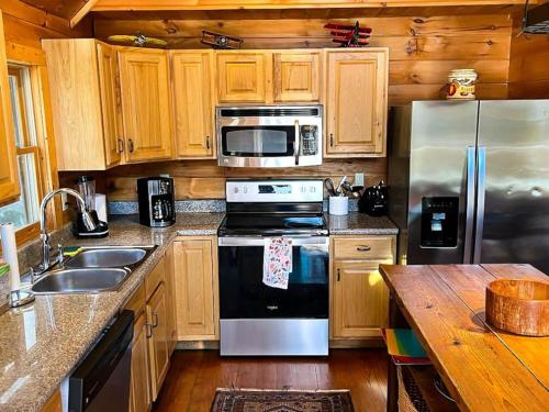 Spacious Log Cabin With Creek 2 Min From Ski Resort in Swiss, USA