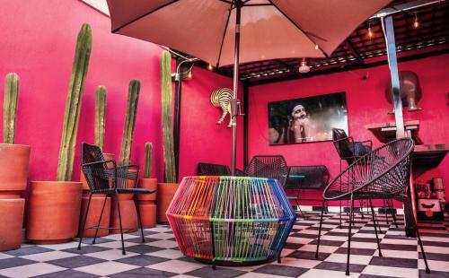 Shared lounge/TV area, Homestal California Hostal en Tlaquepaque in Tlaquepaque