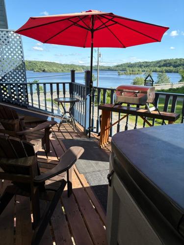 Domaine de la Baie, Les Suites in ชาวินิแกน (ควิเบก)