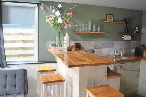 Have a nice stay! - Trendy Vakantiehuis Carpe Diem met eigen tuin in Noordwijk