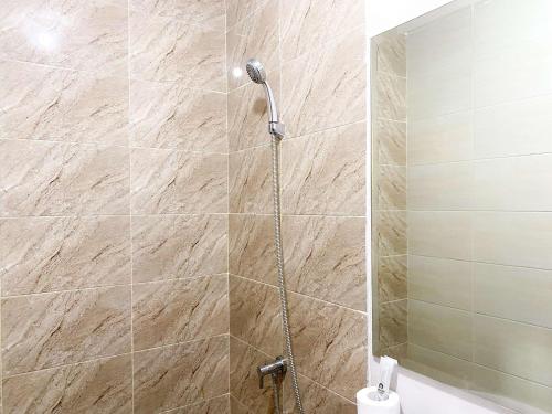Studio Apartment room in Homey and Well Design Studio Transpark Juanda Bekasi Timur Apartment By Travelio
