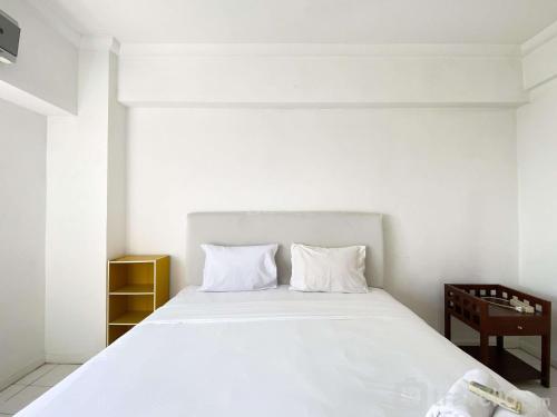 Comfort 2BR at Bona Vista Apartment By Travelio