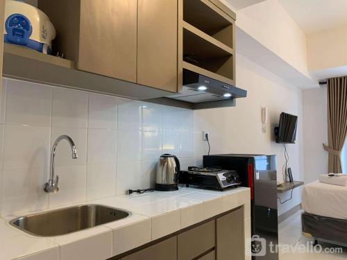 Homey Studio at Tokyo Riverside PIK 2 Apartment By Travelio