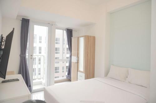 Great Studio at Tokyo Riverside PIK 2 Apartment By Travelio, Rawalembang