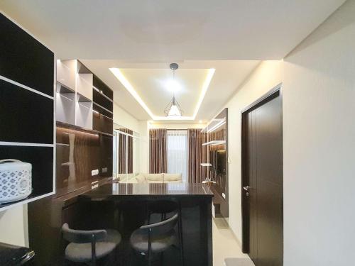 Spacious and Elegant 1BR at Patraland Amarta Apartment By Travelio Spacious and Elegant 1BR at Patraland Amarta Apartment By Travelio