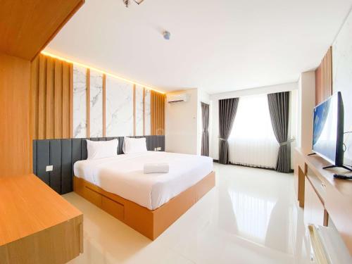 Homey and Strategic Studio (No Kitchen) at Sentraland Semarang Apartment By Travelio - image 3