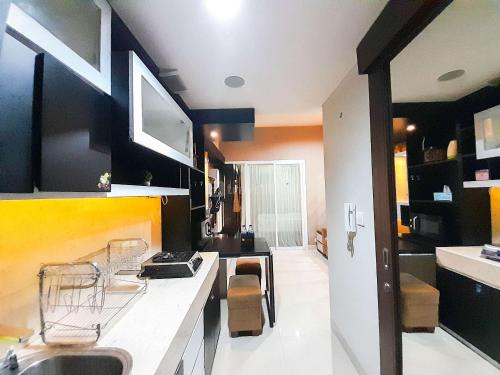 Brand New and Good Simply 1BR at Uttara The Icon Apartment By Travelio - image 3