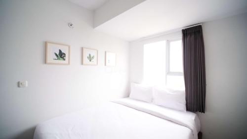 Compact and New 2BR Apartment at Suncity Residence By Travelio - image 3
