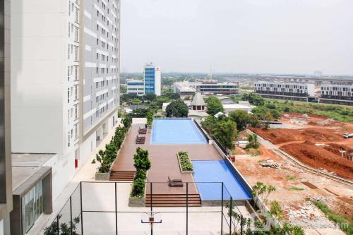 1BR Spacious Combine Unit at Vasanta Innopark Apartment By Travelio