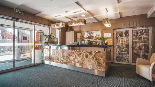 Malkia Penzion in 奥雷奇奥瓦博顿