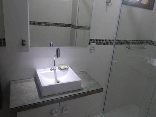 Apartamento em Torres perto do mar e do rio com cama king
