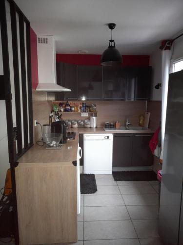 kuhinja, chambre climatisée à louer chez l'habitant (chambre climatisee a louer chez l'habitant) in Saint-Jean-de-Braye