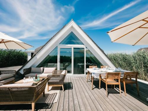 Seehütte Sonnenschilf - Premium Hide-Away Ferienhaus in Rust direkt am Neusiedlersee in Rust, Österreich