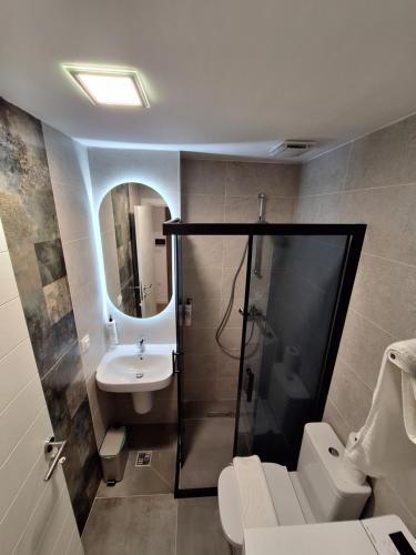 Executive Suites by Modern Living Room Type - Two-Bedroom Apartment with Balcony Executive Suites by Modern Living Room Type - Two-Bedroom Apartment with Balcony