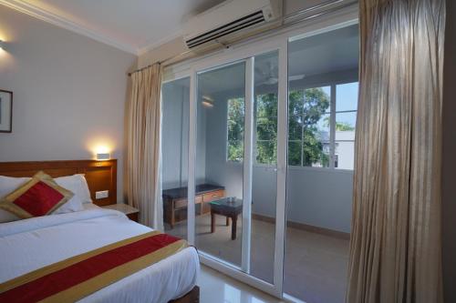 TGR SUITES – Cochin, NE