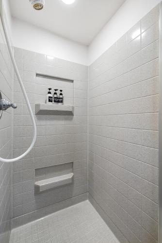 Rocky Shore Escape by Casago McCall - Donerightmanagement