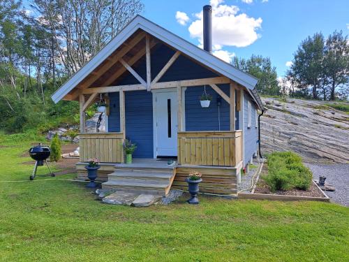 Kleines Haus am Fjord in 阿菲奧德