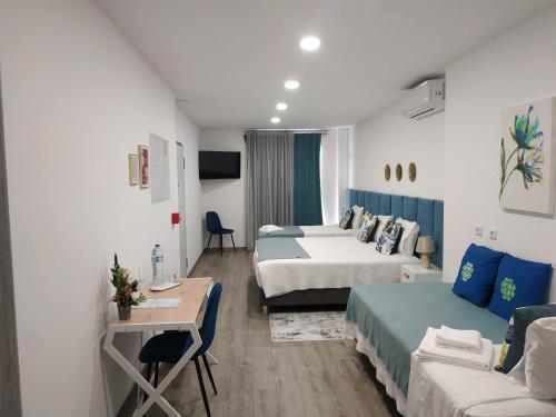 Garden House Fundão - Quarto familiar com WC privativo chambre d'hôte Fundão