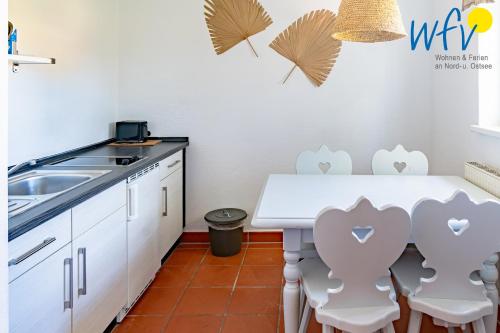 Ferienhaus am Gutspark Drankse Ferienwohnung Sonnenkuss in Dranske, Deutschland
