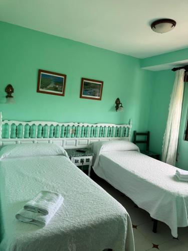 El Castañu de Cué (El Castanu de Cue) in แอลลาเนส