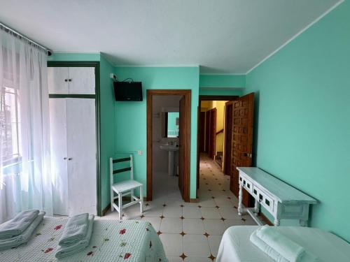 El Castañu de Cué (El Castanu de Cue) in แอลลาเนส