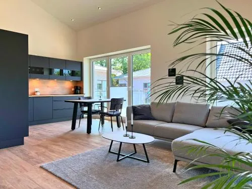 Haus Kiebitz 2 OG - Neubau-Apartment mit Infrarot-Sauna, Balkon & 600 m zum Strand in Varel, Deutschland