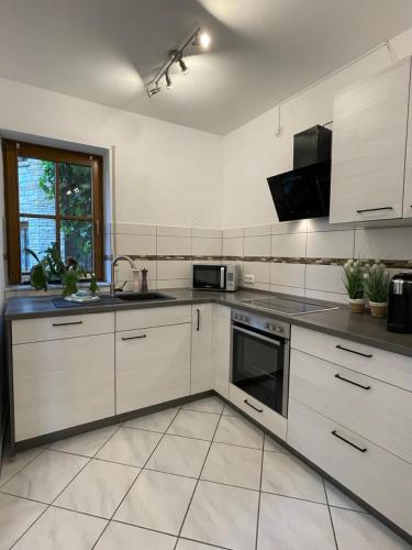 廚房, Ferienhaus Schwalbennest in 布蘭肯拉特