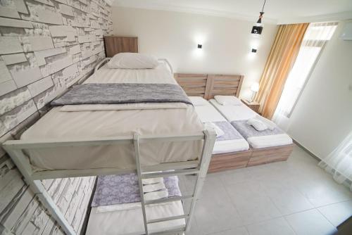 2 twin beds, 1 bunk bed